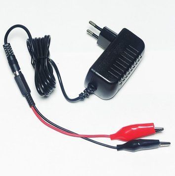 Зарядное устройство 15V (12V) 1500mah для детского электромобиля 1428 фото